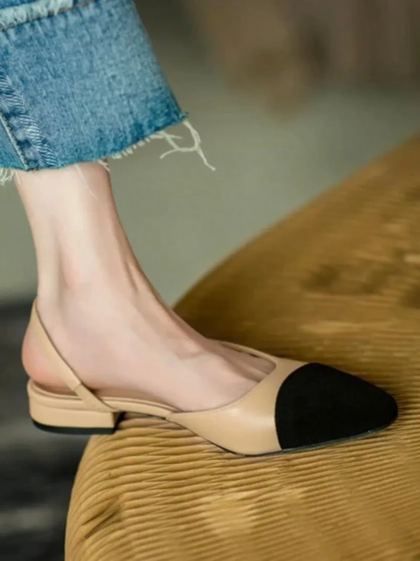 Beige and black flats shoes